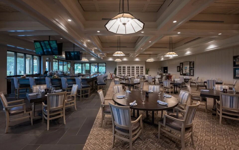 Upgraded bar and dining room at Cherokee Country Club featuring integrated audio and video systems for events and member experiences