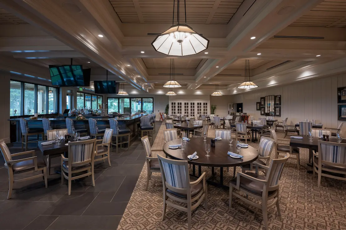 Upgraded bar and dining room at Cherokee Country Club featuring integrated audio and video systems for events and member experiences