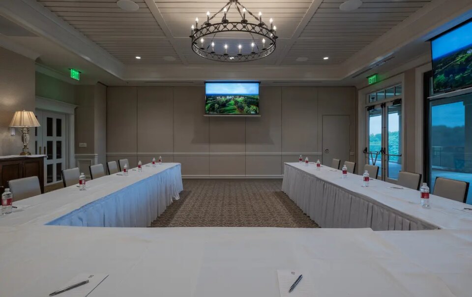 Smart AV conference room integration at Cherokee Town and Country Club with displays, cameras, and touch controls