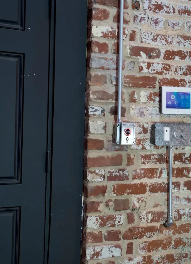 Secure studio entrance with integrated access control and surveillance designed for private use
