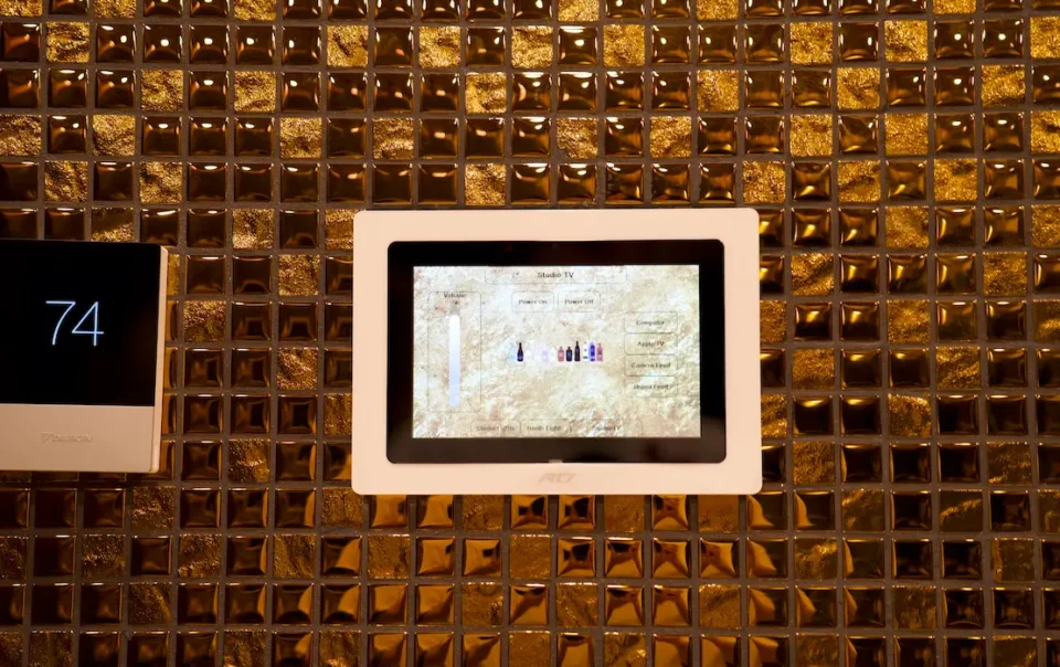 Wall-mounted smart panel for controlling sound, lighting, and AV settings in Sovereign's immersive studio
